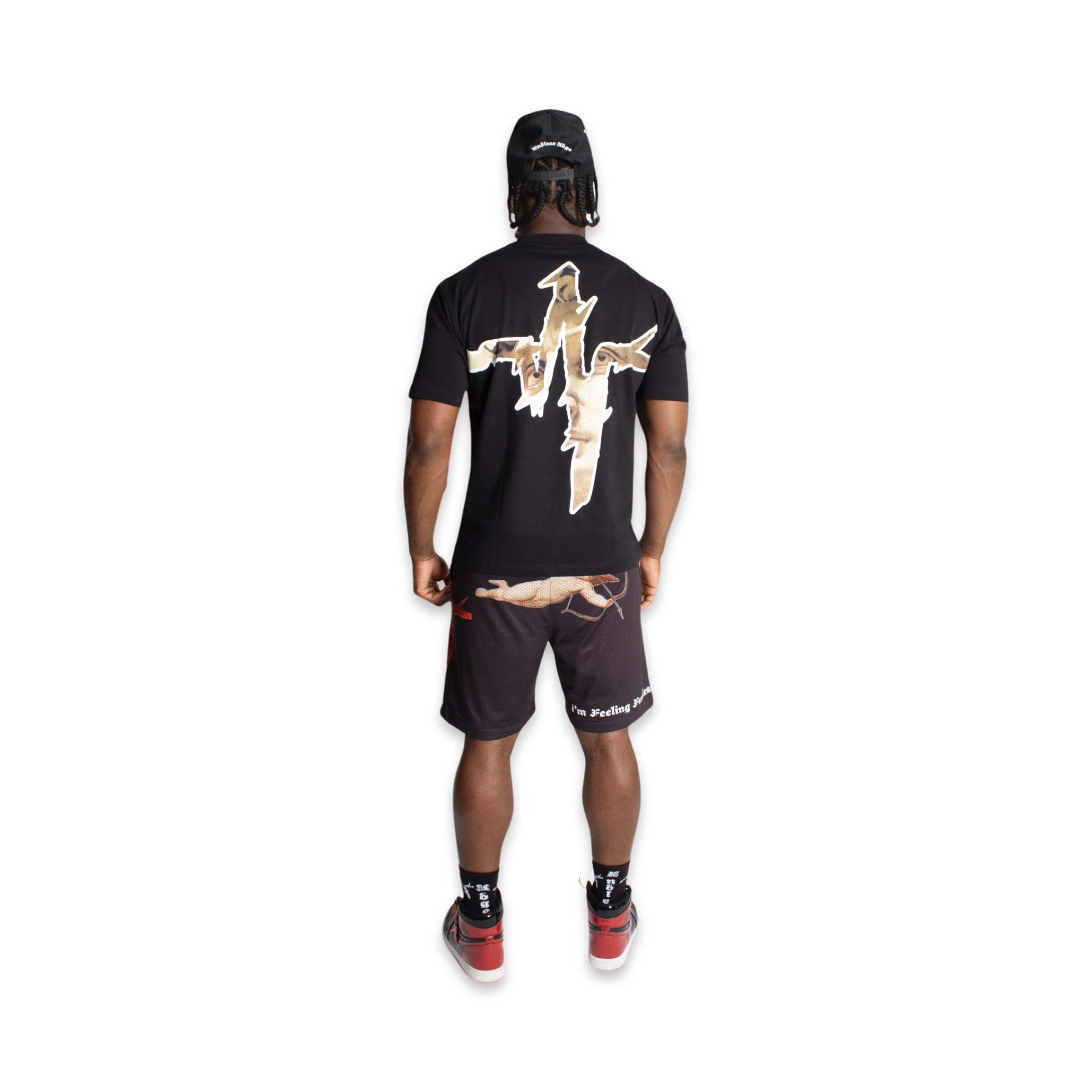 Model featured in Endless Edge designer surfer snapback, Endless Edge designer Crest Logo t-shirt, Endless Edge designer Angel mesh shorts, and Endless Edge black designer socks