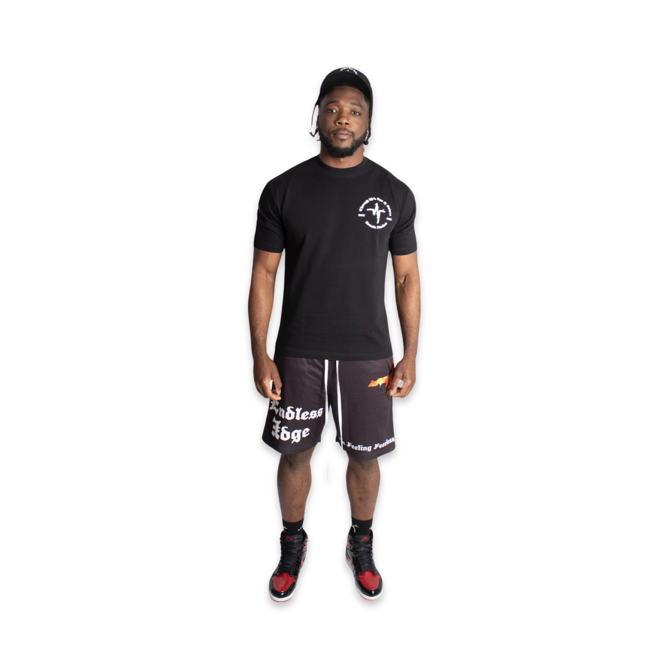 Model featured in Endless Edge designer surfer snapback, Endless Edge designer Crest Logo t-shirt, Endless Edge designer Angel mesh shorts, and Endless Edge black designer socks