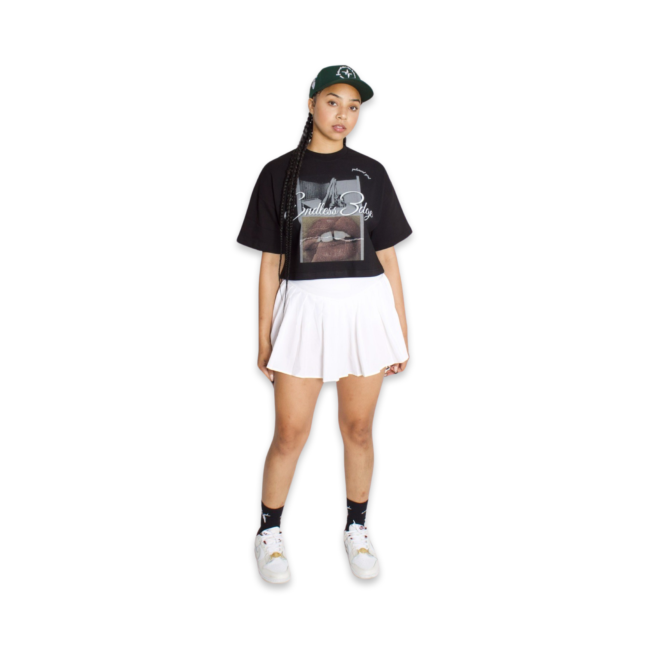 Model featured in Endless 3dge design cap, Endless 3dge design Polaroid Crop Tee, and black Endless 3dge designer socks